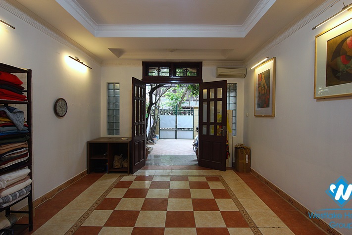 The first floor with two yards for rent for doing business on To Ngoc Van st, Tay Ho district